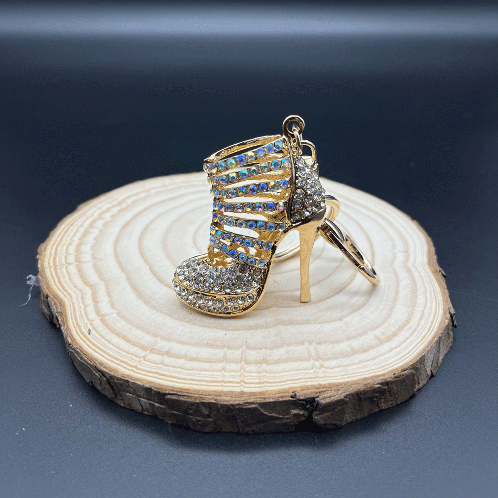 Gouden highheels met witte strass steentjes